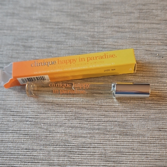 Clinique Happy in Paradise Rollerball Limited Edition & Donald × Clinique Pouch. - Picture 2 of 6